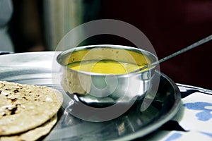 Indian Cuisine Kadhi - Vegetarian Curry Made of Buttermilk And Chick Pea Flour.