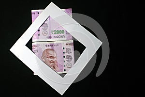 Indian currencies. 2000 rupee note. Indian currency isolated on black background.