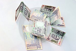 Indian currency of 100 rupee notes.