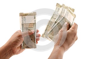 Indian currency notes and toy car in the hands bank loan concept