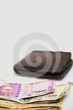 Indian Currency Showing Of 10,500 And 2000 Rupees with Wallet - white background