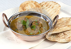 Indian Curry with Naan Bread photo