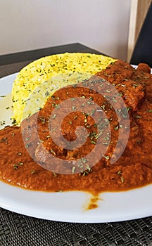 Indian curry with yellow rice