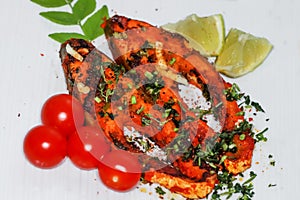 An Indian delicacy spicy Tawa fish platter