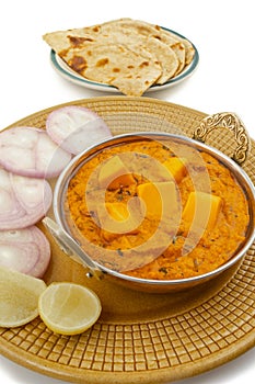 Indian Delicious Spicy Vegetarian Cuisine Paneer Toofani Served with Tandoori Roti on White Background