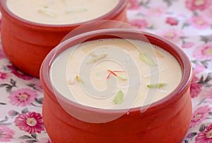 Indian dessert- kesar pista basundi in earthen pot kulhad