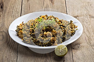 Indian Dish: Bitter gourd fry with spices and herbs