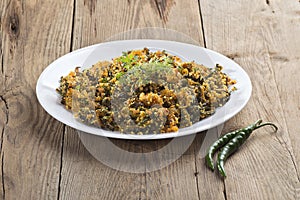 Indian Dish: Bitter gourd fry with spices and herbs