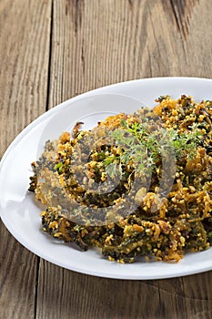 Indian Dish: Bitter gourd fry with spices and herbs