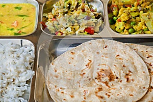 Indian dish thali, subji, rice and chapati bread