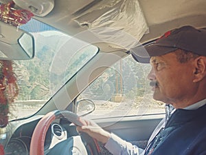 An indian Driver drives the car