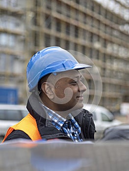 Indian engineer, profile portrait outdoors