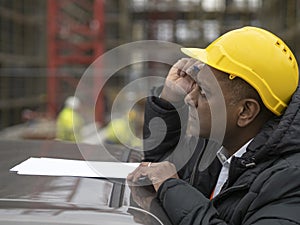 Indian engineer signing contracts or reports