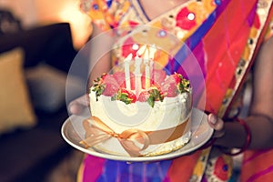 Indian family celebrating a birthday party