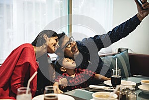 Indian Family out for meal in restaurant