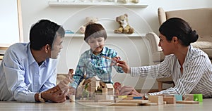 Indian family play dinosaurs toys and cube set at home