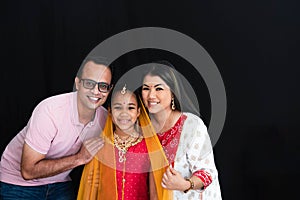 Indian family taking pictures with family concept