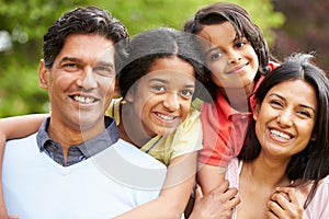 Indian Family Walking In Countryside