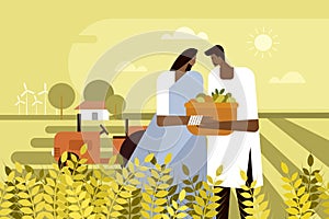 Indian farmer couple holding a basket of farm produce in their hand