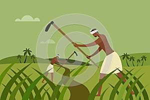 Indian farmers using spades working in a farm