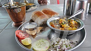 Indian fast food snack misal with pav bun