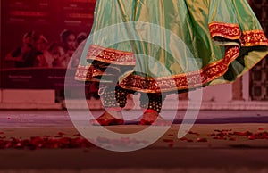 Indian female artist performing indian classical dance kathak photo