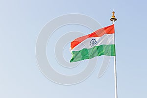 Indian flag flying high on a flagpost