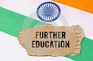 The Indian flag has a cardboard box with the inscription- FURTHER EDUCATION
