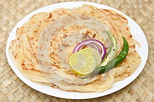 Indian flat bread Kerala porotta, Malabar porotta, roti paratha layered bread made of whole wheat flour