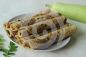 Indian flat bread made of whole wheat flour, grated bottle guard, yogurt and spices. Commonly called as lauki paratha in India