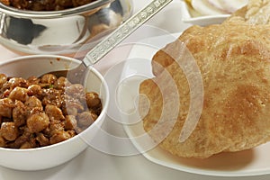 Indian Food: Chana Masala and deep fried Puri.