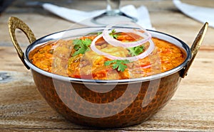 Indian Food or Indian Curry in a copper brass serving bowl