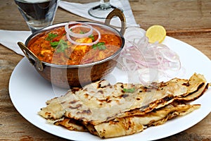 Indian Food or Indian Curry in a copper brass serving bowl