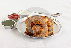 Indian Food Kabuli Chana Tikkis or Chickpea Patties and Side Dishes