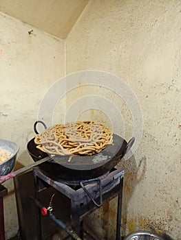 Indian food Masala chakli making process closeup view