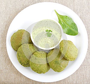 Indian food palak or spinach poori photo