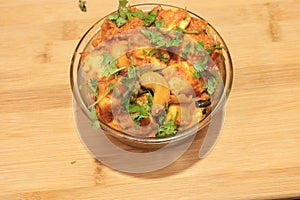 Indian food paneer butter masala in a Glass bowl