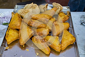 Indian food samose and bread pakode on sale