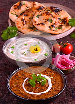 Indian food - tandoori roti methi malai matar and dal makhni photo