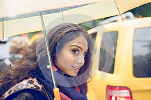 Indian girl in New york in a rainy day.