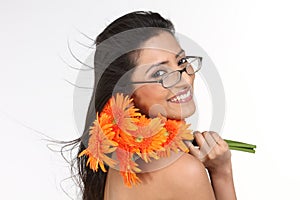 indian girl with orange daisy flowers