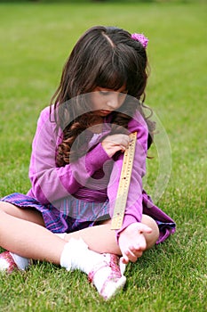 Indian girl with ruler