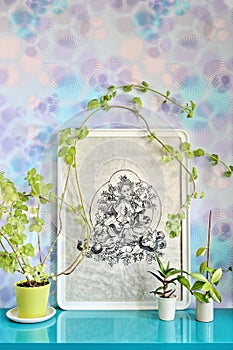 Indian goddes framed print decorated with flowers
