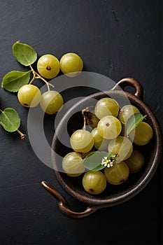 Indian Gooseberry (Amla) on black background