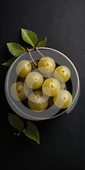 Indian Gooseberry (Amla) on black background