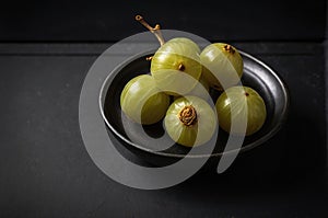 Indian Gooseberry (Amla) on black background