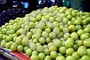 Indian gooseberry selling in market, Tasty and healthy indian gooseberry Indian