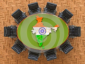 Indian goverment meeting. Map of India on the round table, 3D rendering photo