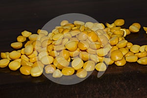 Indian gram (Cicer erytinum) or yellow gram dal on the table