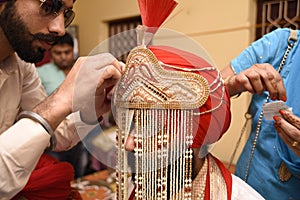 Indian groom wearing turban pagri kolkata india